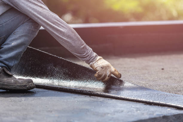 Professional Waterproofing technician working in Webster, NY